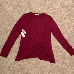 Long sleeved burgundy top